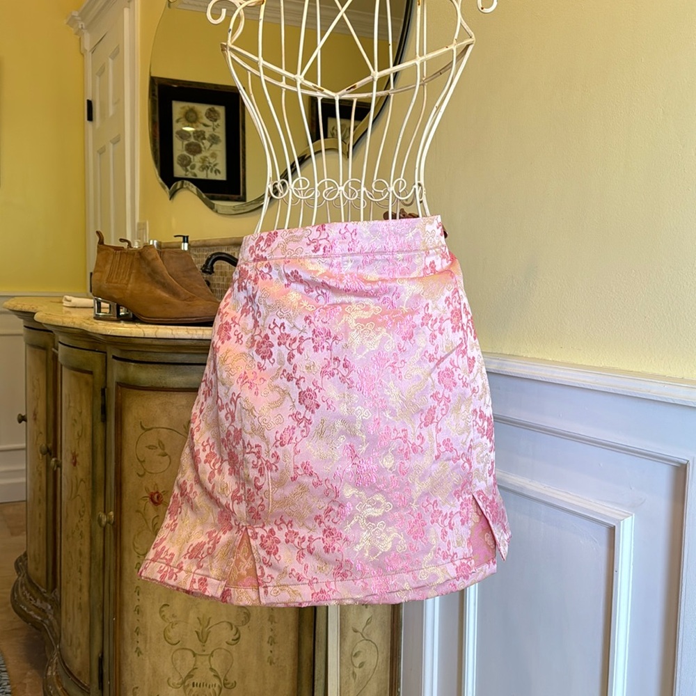 Pink brocade mini skirt with gold dragon print